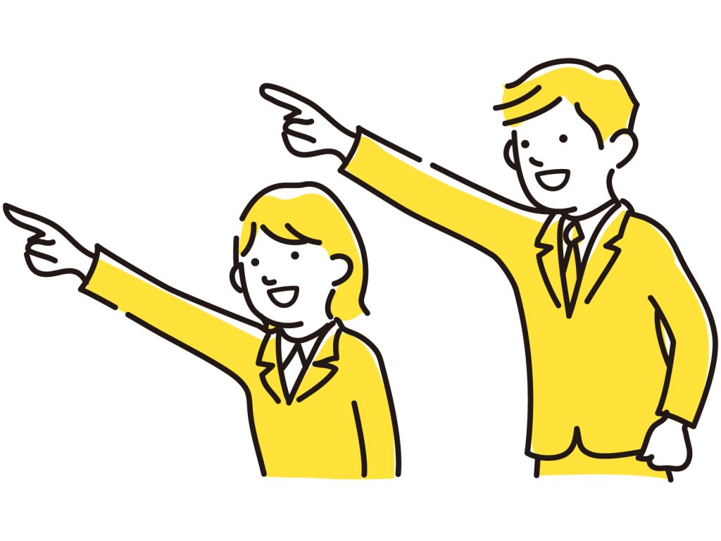 遠くを指さしている男女