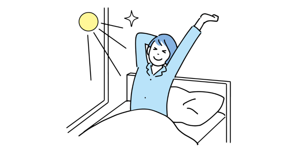 太陽が当たる中起床した女性